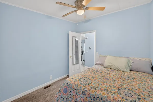 a view of swimming pool with a yard