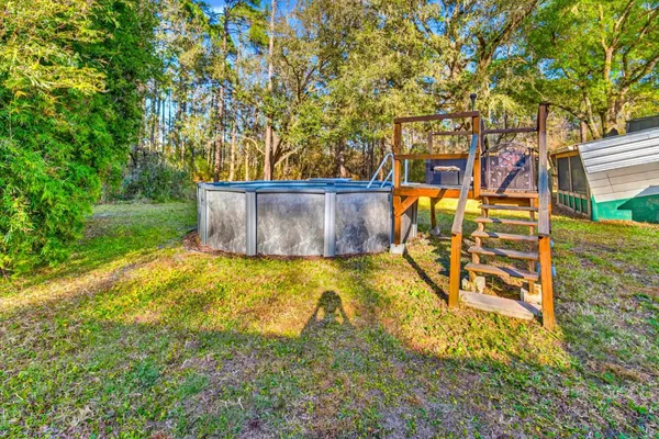 a view of a house with a swimming pool