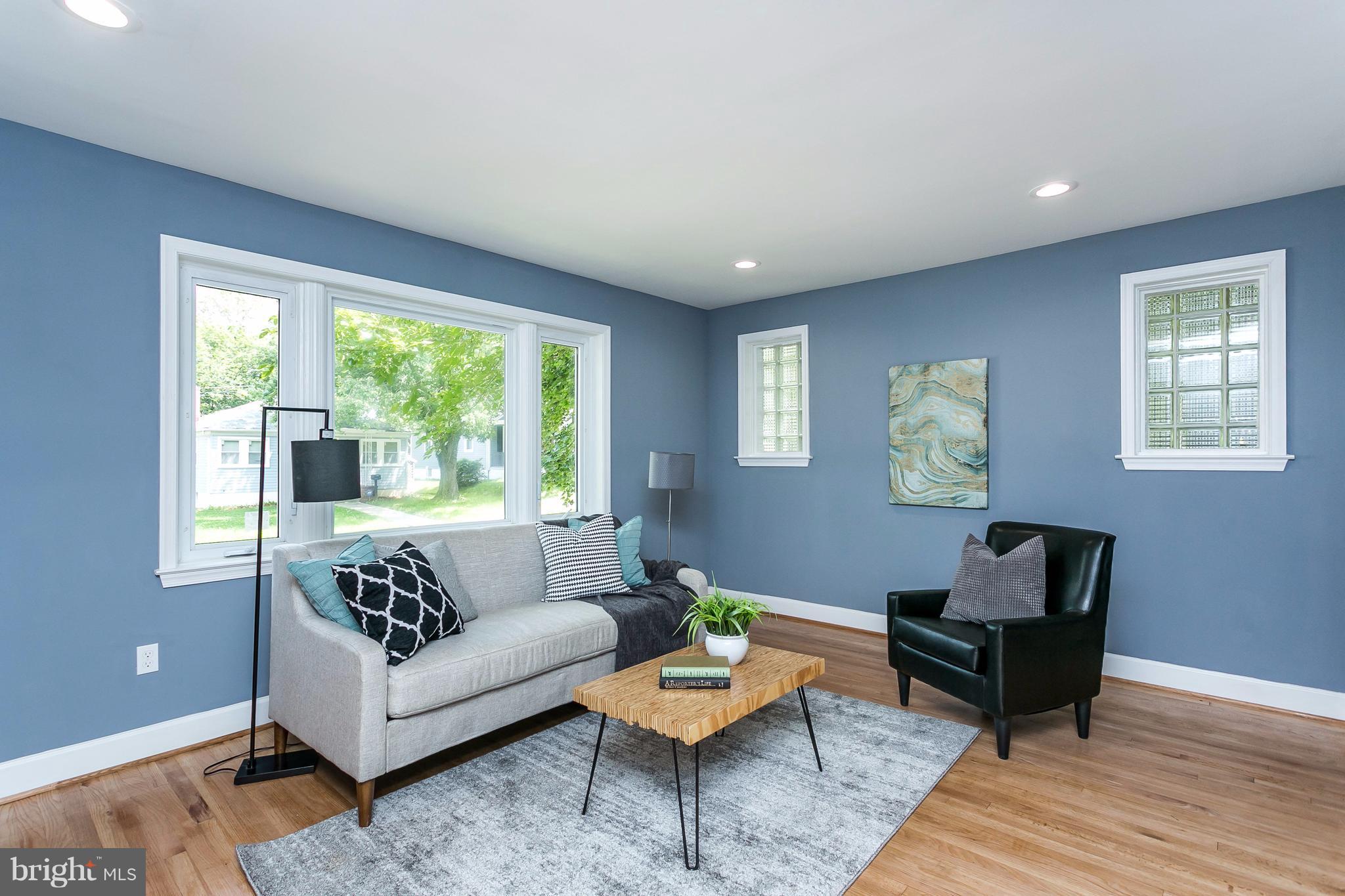 3203 Cedarhurst Road Baltimore, MD 21214 - Photo 4 of 29 a living room with furniture and a window