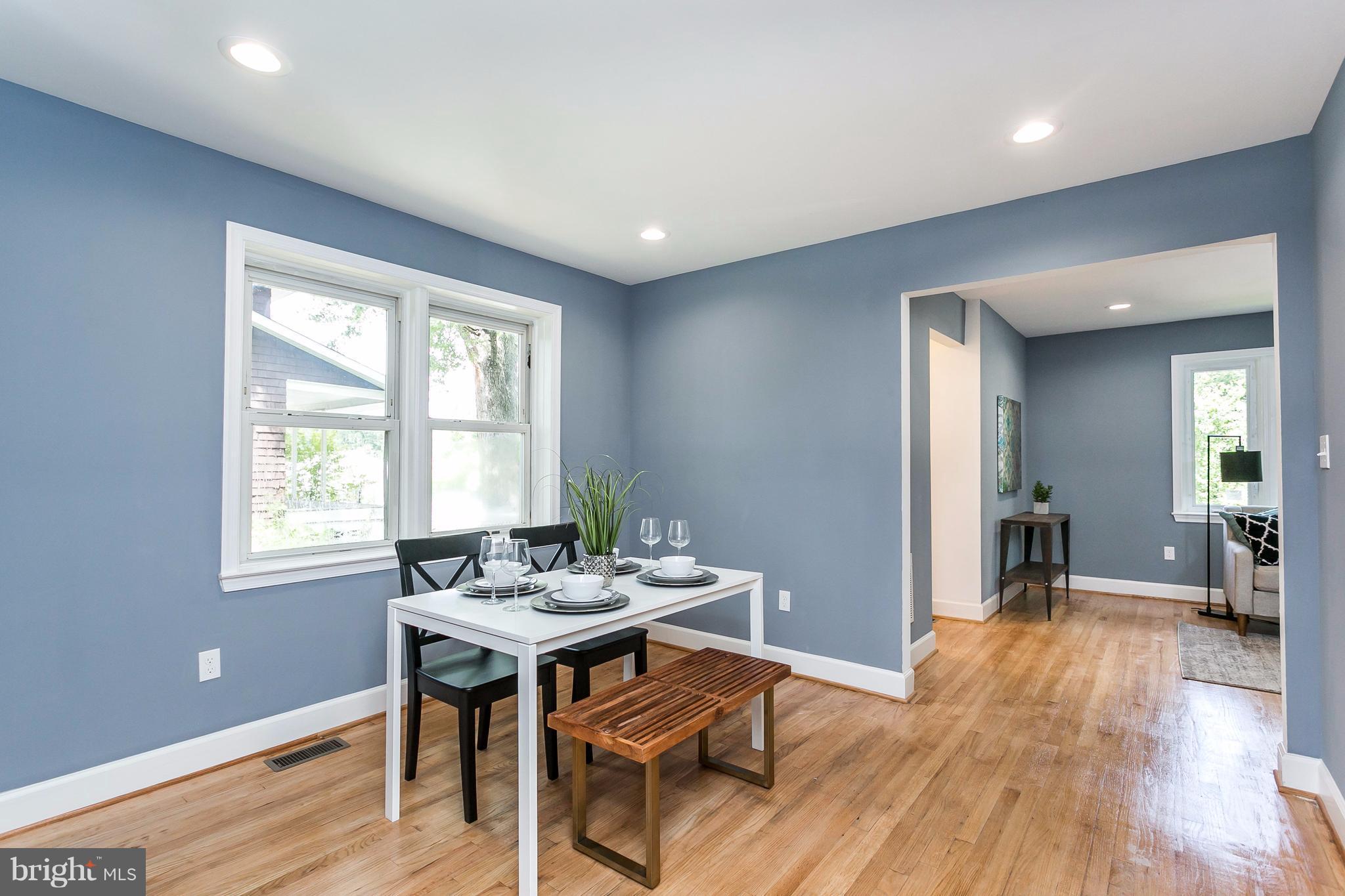 3203 Cedarhurst Road Baltimore, MD 21214 - Photo 8 of 29 a workspace with wooden floor