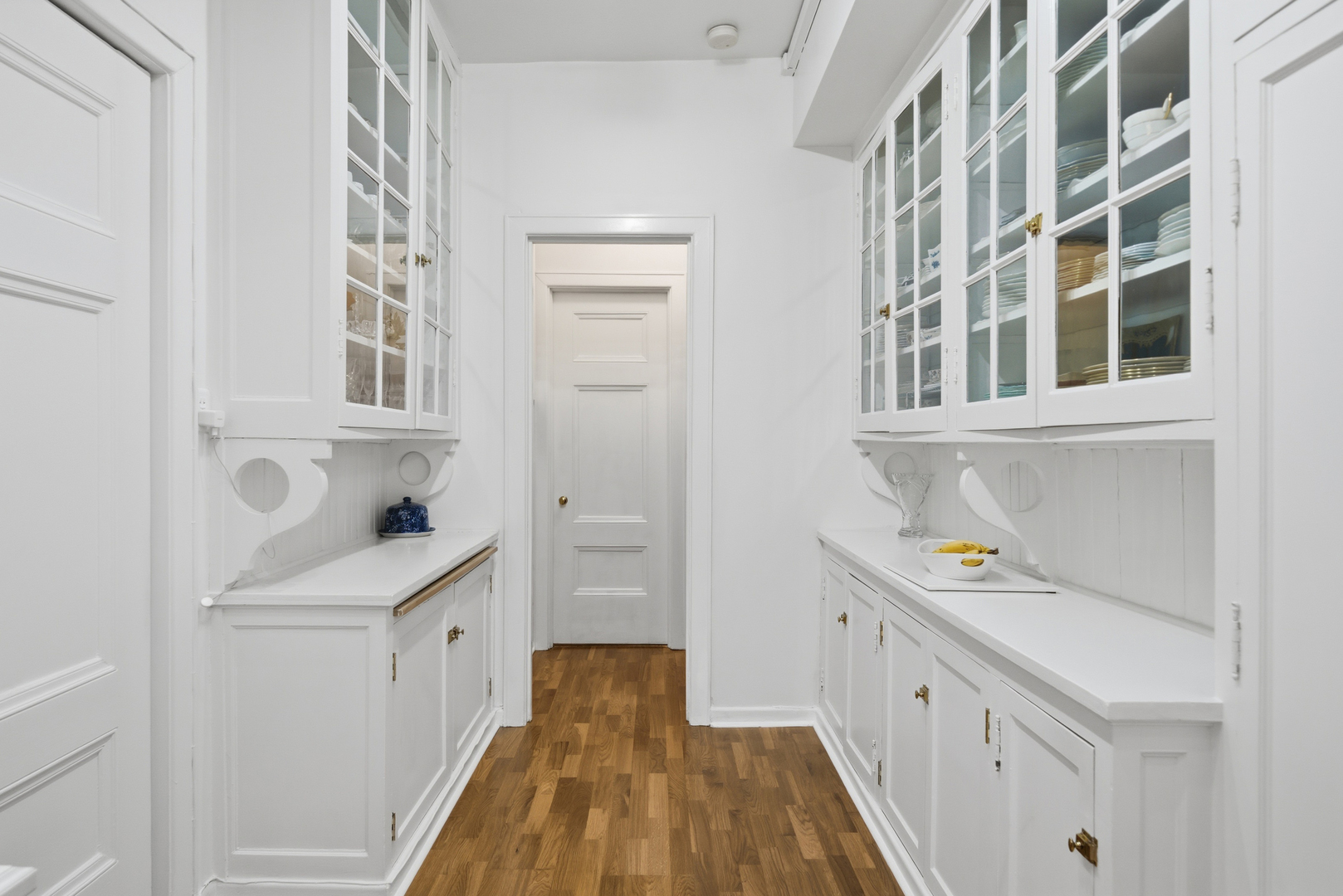 232 East Walton Place, Unit 3E Chicago, IL 60611 - Photo 13 of 36 a kitchen with a sink and cabinets