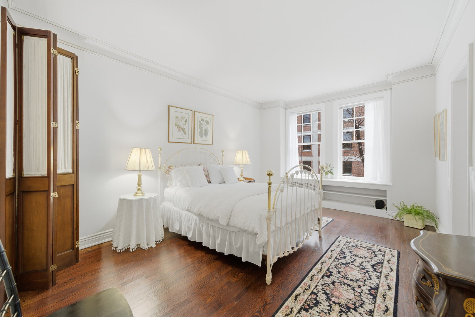 232 East Walton Place, Unit 3E Chicago, IL 60611 - Photo 27 of 36 a bed room with a bed and a window