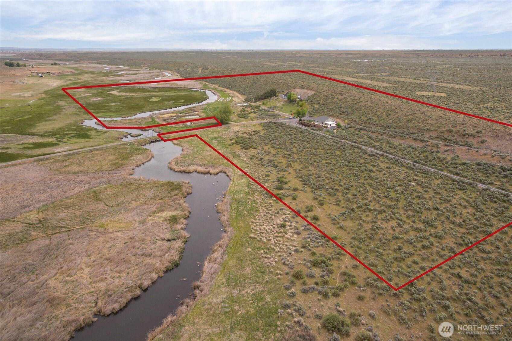 11975 Northeast Neppel Road Moses Lake, WA 98837 - Photo 2 of 33 a view of an ocean from a balcony