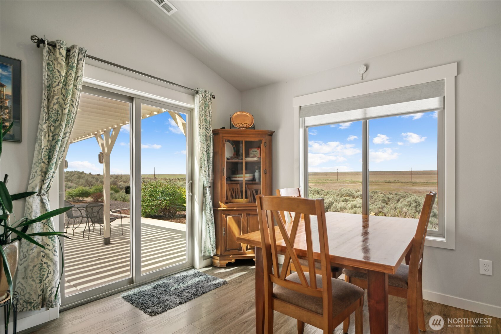 11975 Northeast Neppel Road Moses Lake, WA 98837 - Photo 8 of 33 a view of a dining room with furniture window and outside view