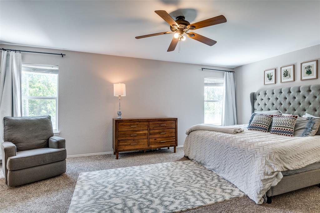 4018 Cedar Elm Lane Dallas, TX 75212 - Photo 11 of 22 a bedroom with a bed couches and window