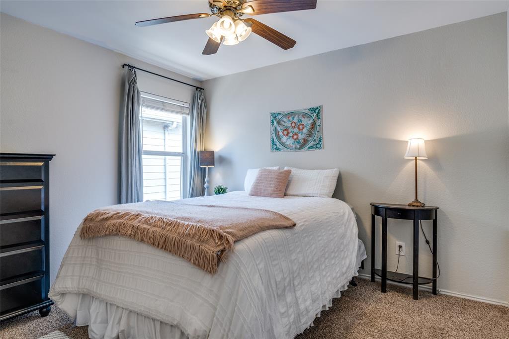 4018 Cedar Elm Lane Dallas, TX 75212 - Photo 19 of 22 a bedroom with bed and a window