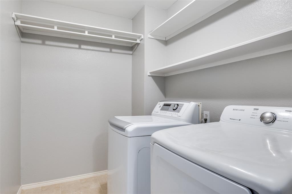 4018 Cedar Elm Lane Dallas, TX 75212 - Photo 20 of 22 a utility room with dryer and washer