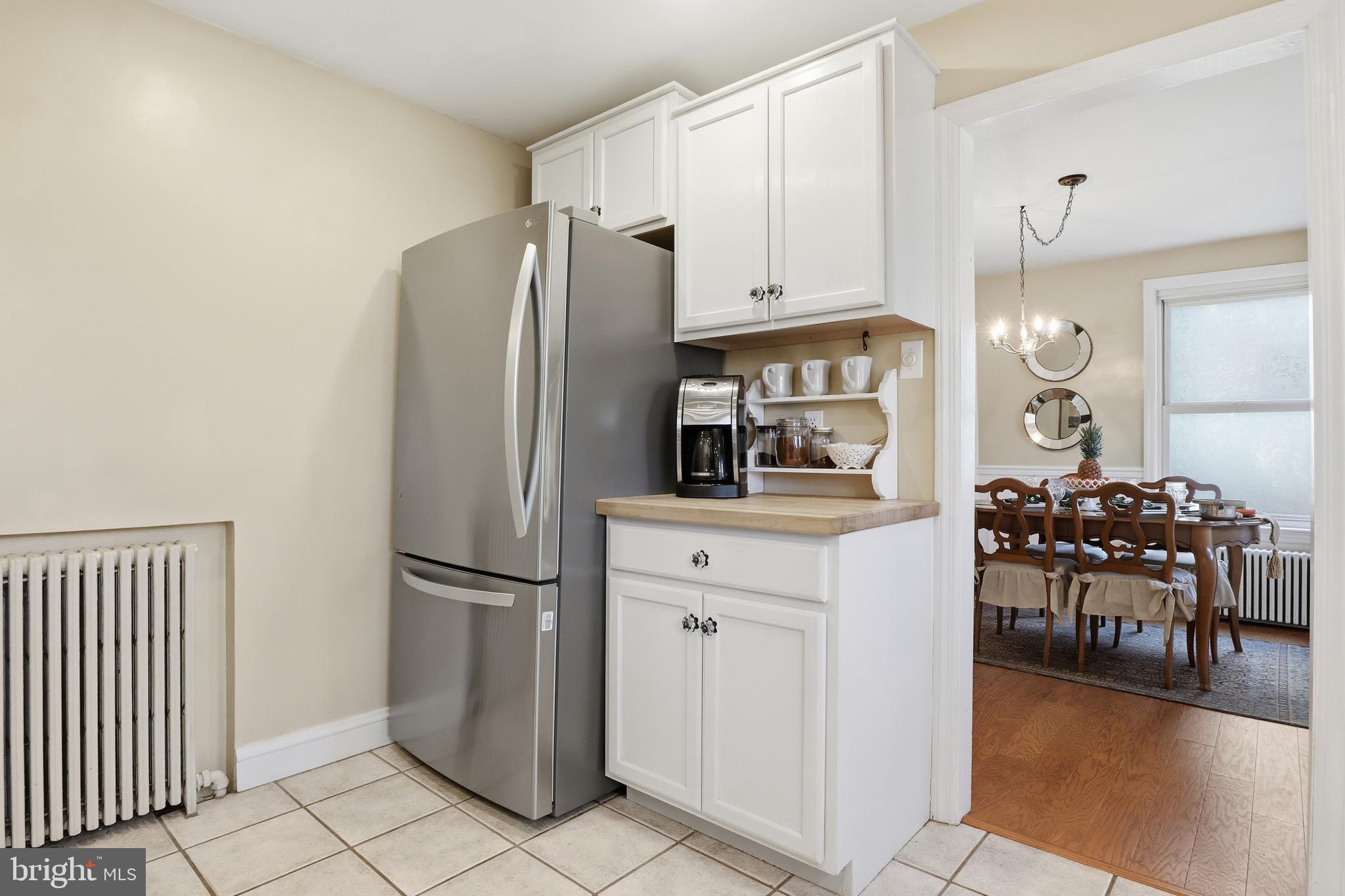 357 Old Garden Lane York, PA 17403 - Photo 13 of 62 a kitchen with stainless steel appliances granite countertop a refrigerator and a stove top oven