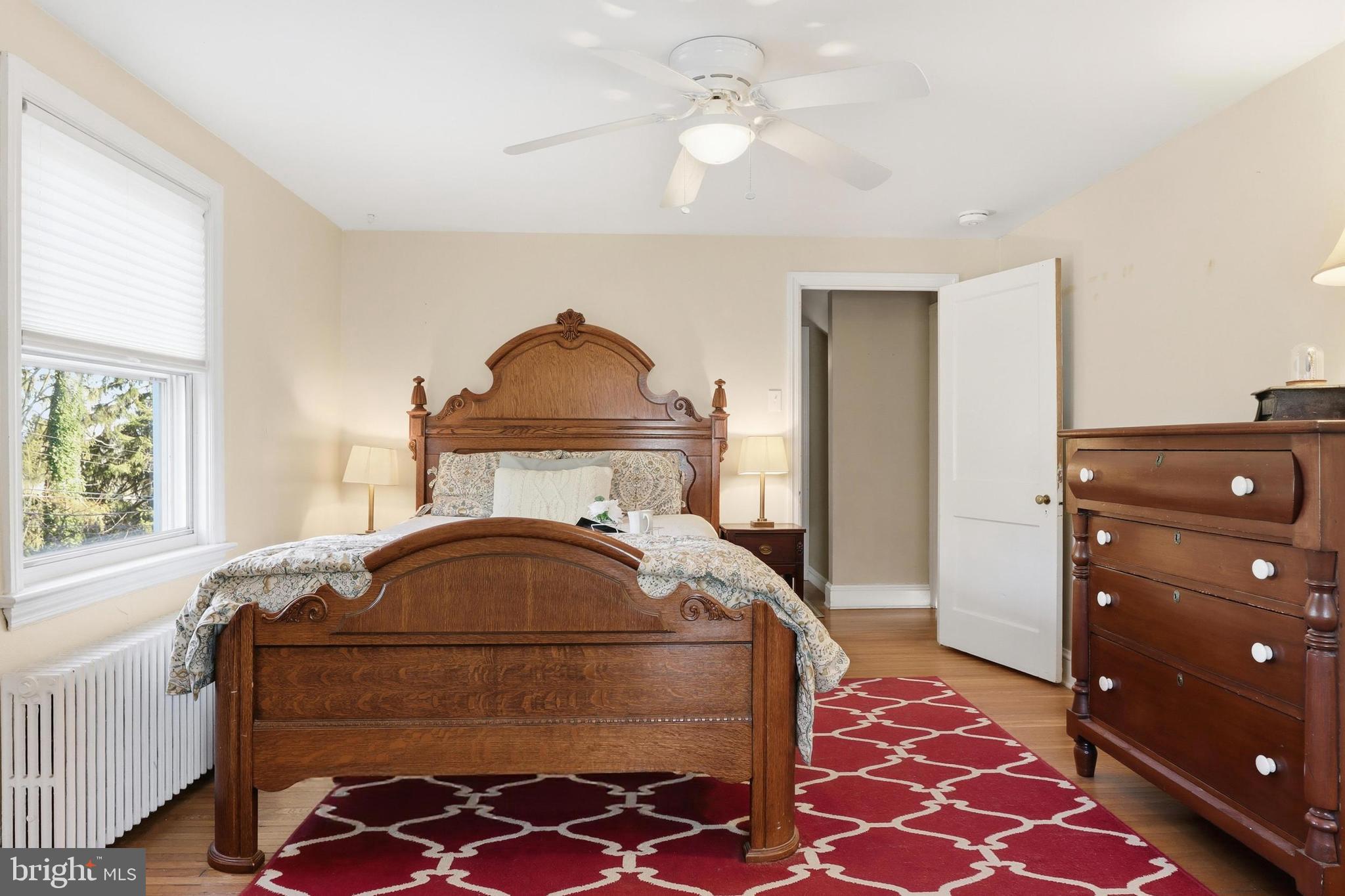 357 Old Garden Lane York, PA 17403 - Photo 21 of 62 a bedroom with a bed and a chandelier