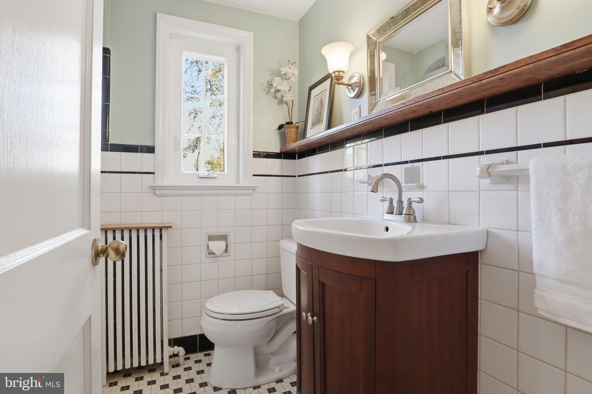 357 Old Garden Lane York, PA 17403 - Photo 26 of 62 a bathroom with a sink a toilet and mirror