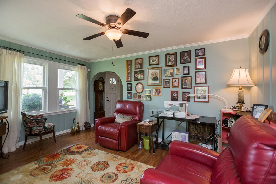 3501 Academy Road Portland, TN 37148 - Photo 8 of 22 a livingroom with workspace couch and a window
