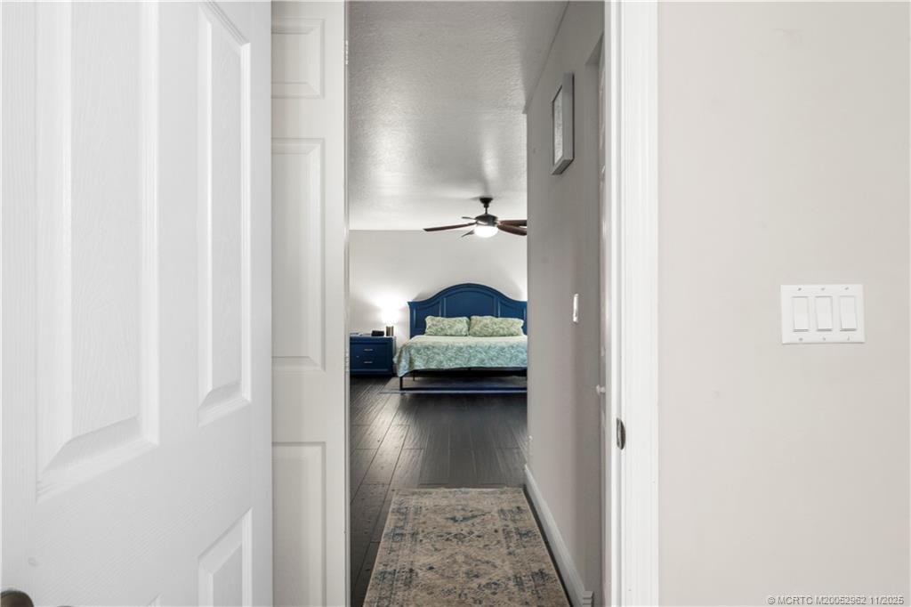 5532 Southeast Graham Drive Stuart, FL 34997 - Photo 17 of 43 a view of bedroom with furniture and a window