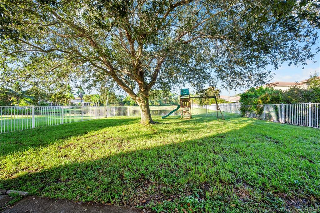 5532 Southeast Graham Drive Stuart, FL 34997 - Photo 29 of 43 a view of a park with large trees