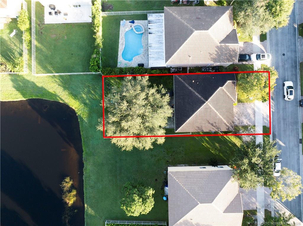5532 Southeast Graham Drive Stuart, FL 34997 - Photo 32 of 43 an aerial view of a residential houses