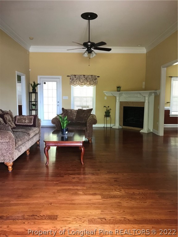 5220 Spreading Branch Road Hope Mills, NC 28348 - Photo 8 of 17 a living room with furniture and a fireplace