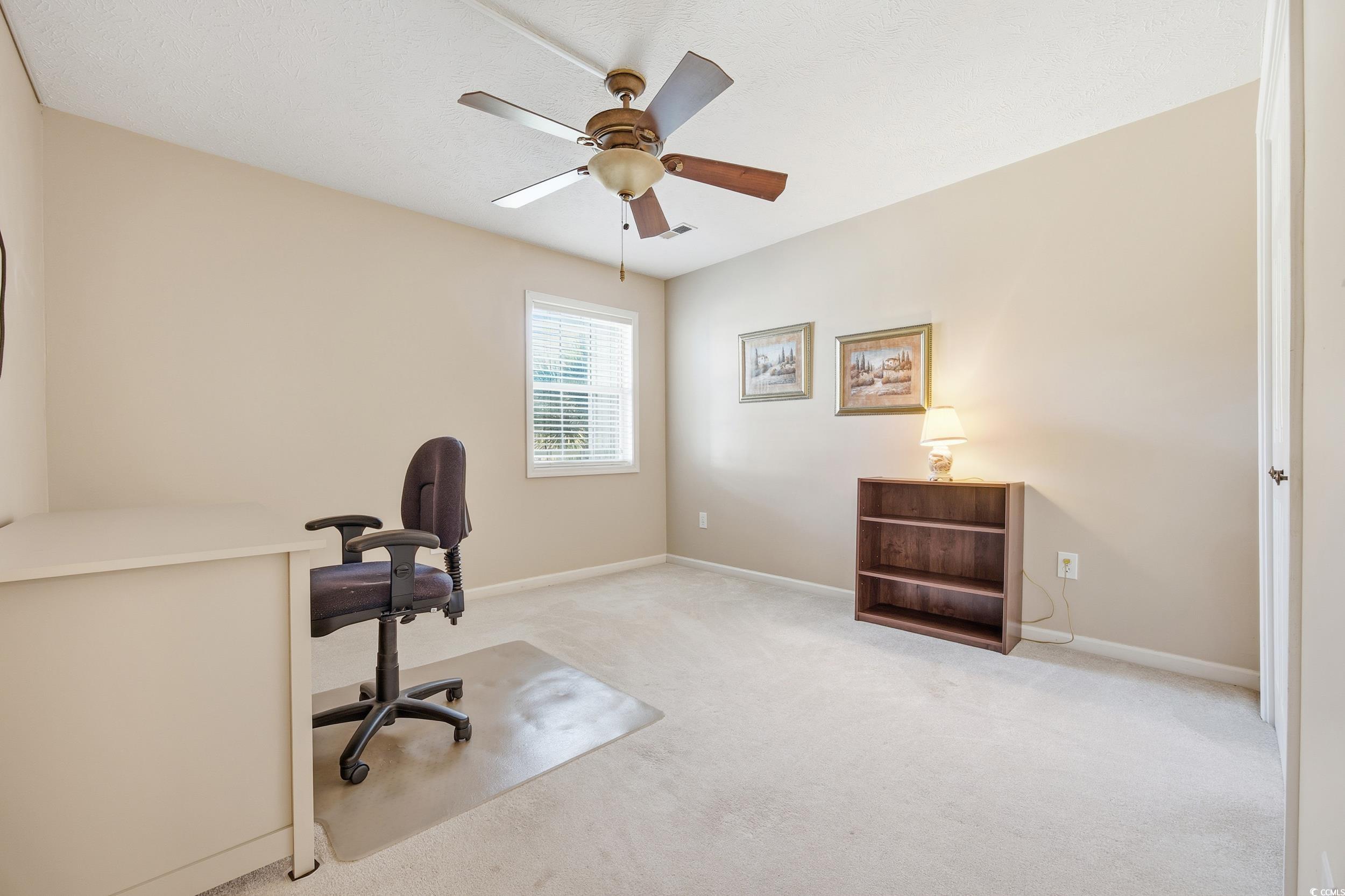 615 Tupelo Lane, Unit F Longs, SC 29568 - Photo 15 of 27 Office area featuring carpet and a ceiling fan
