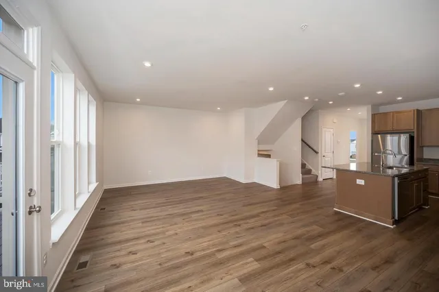 a view of a balcony with wooden floor