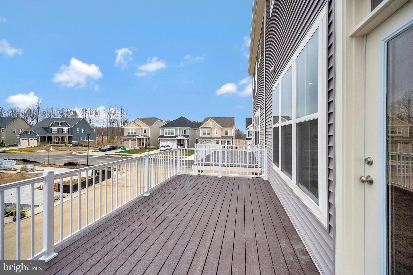 360 Coastal Avenue, Unit 102 Stafford, VA 22554 - Photo 13 of 25 a view of a balcony with wooden floor