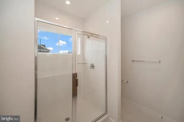 an outdoor space with patio lots of furniture and umbrella