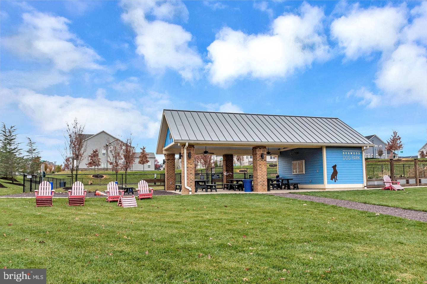 360 Coastal Avenue, Unit 102 Stafford, VA 22554 - Photo 25 of 25 a view of a house with a big yard and large trees
