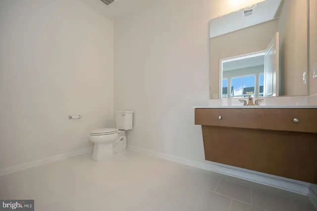 a bathroom with a toilet