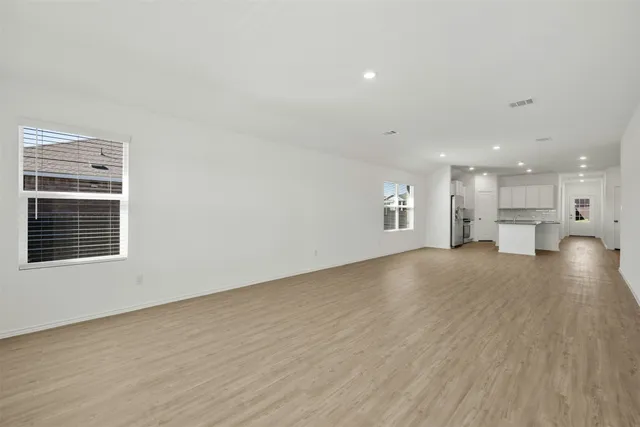 a view of kitchen and kitchen with window