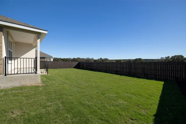 a view of an outdoor space and a yard