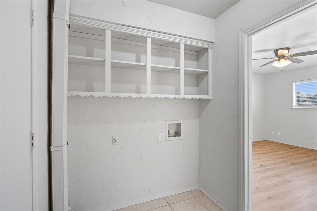 10304 Oak Creek Drive Greenville, TX 75402 - Photo 11 of 25 a view of an empty room with a window