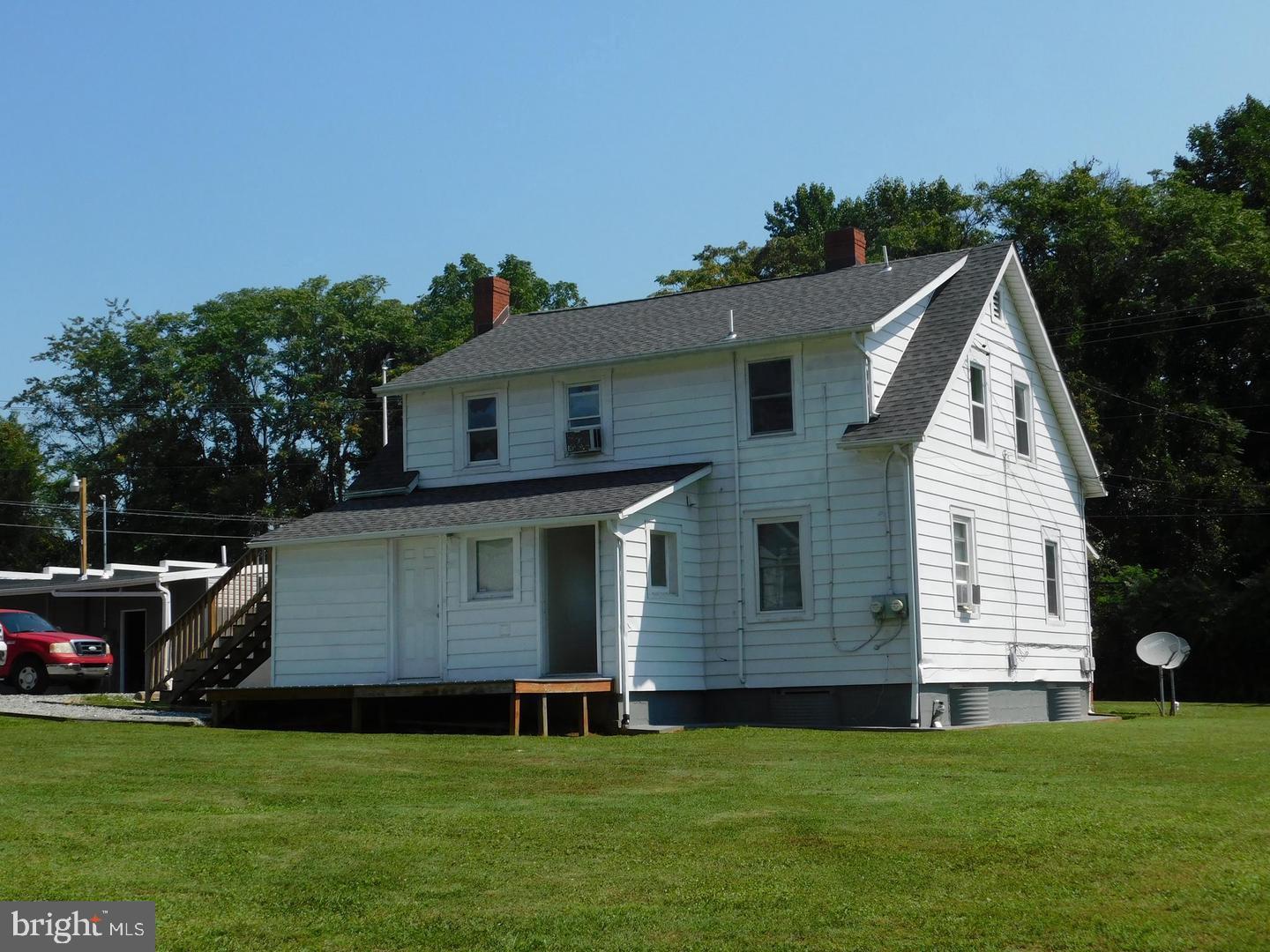 353 Rock Springs Road Conowingo, MD 21918 - Photo 4 of 16 a view of a house with a backyard