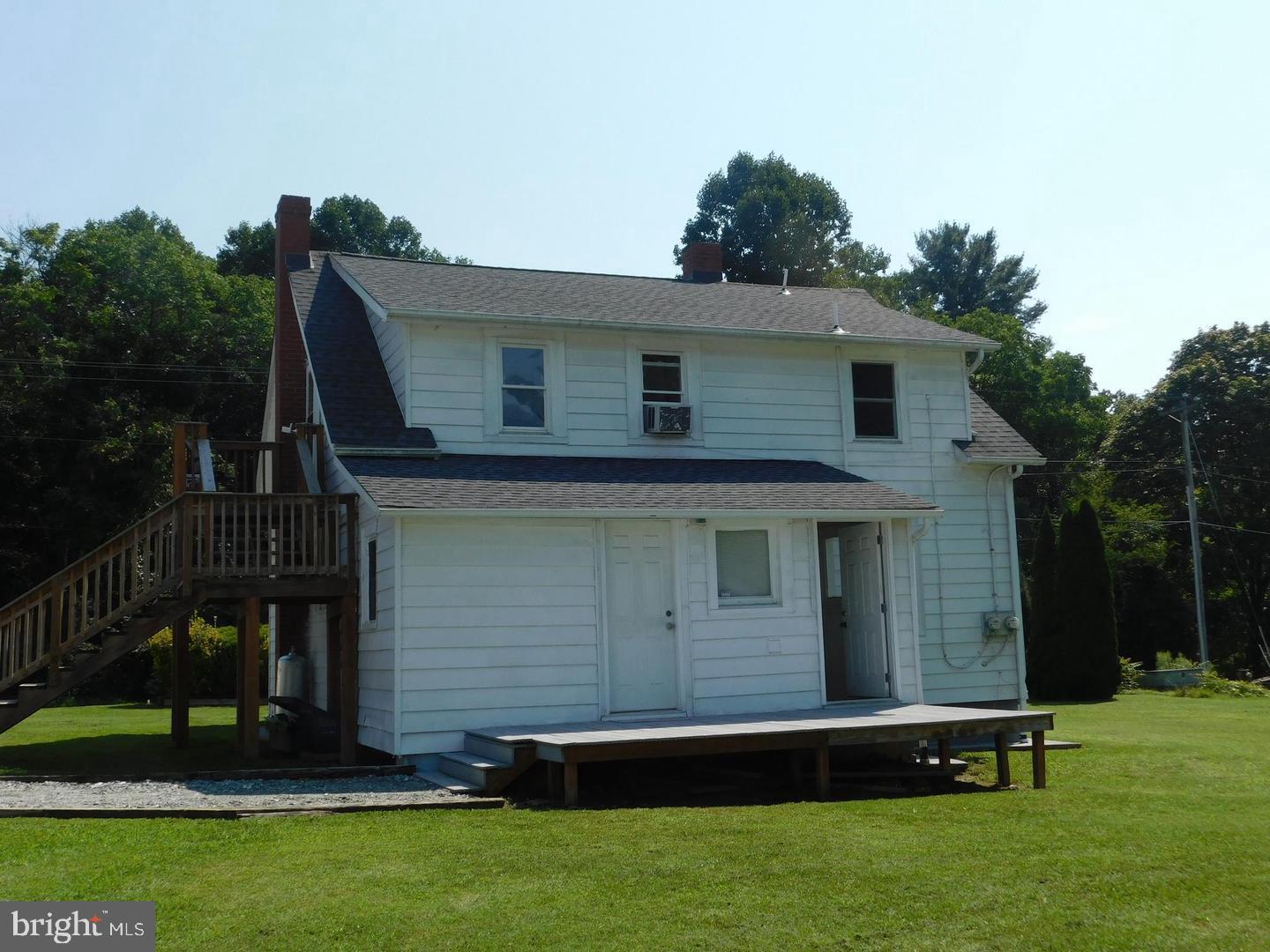 353 Rock Springs Road Conowingo, MD 21918 - Photo 5 of 16 a view of a house with backyard and garden