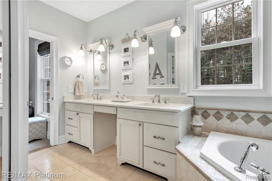 606 South Hacker Road Brighton, MI 48114 - Photo 21 of 42 Double Vanity ~ New Quartz Countertop ~ Timeless Fixtures and Finishes