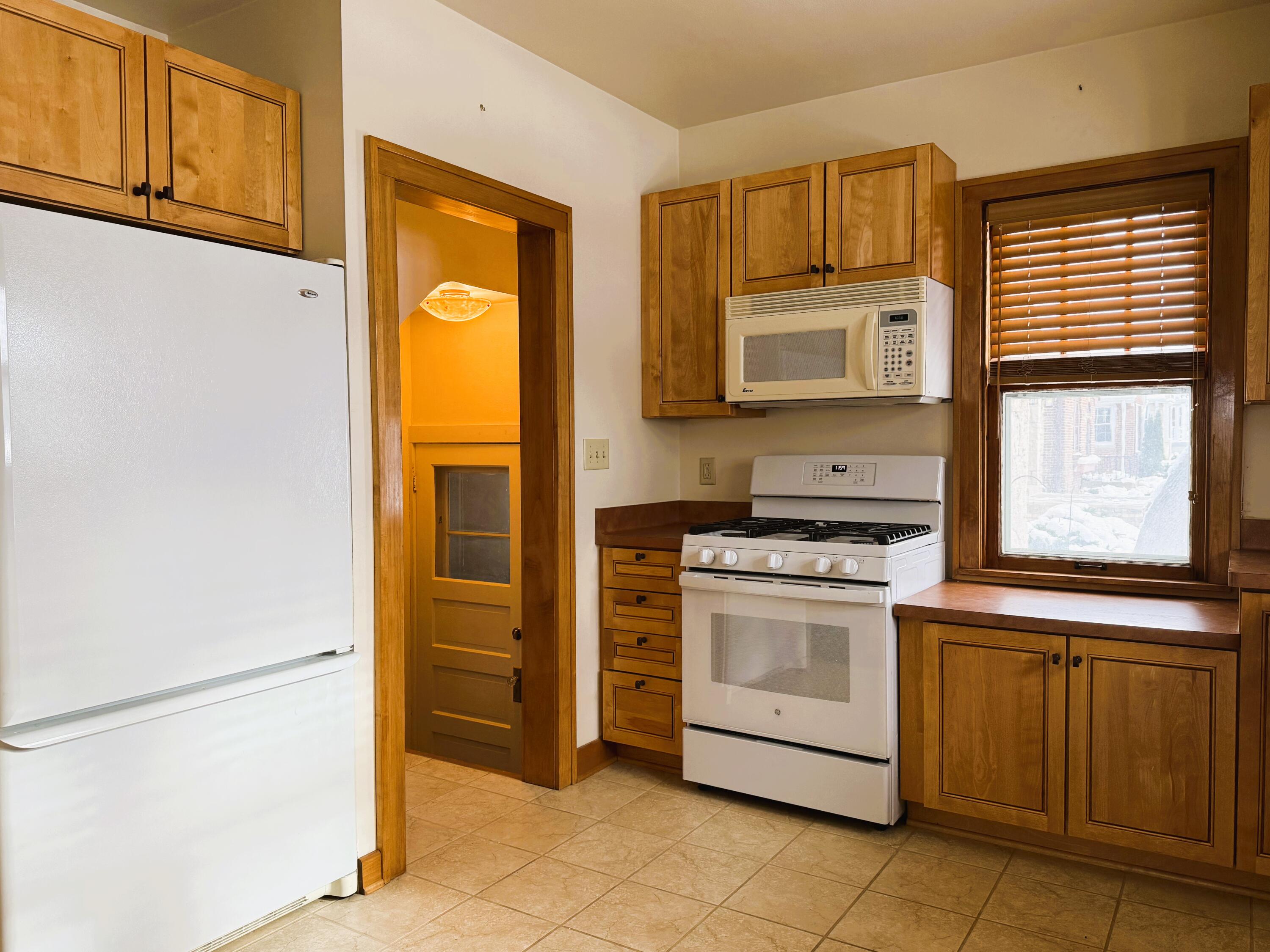 1904 North 83rd Street Wauwatosa, WI 53213 - Photo 14 of 29 Pantry Wall Surrounds Refrigerator