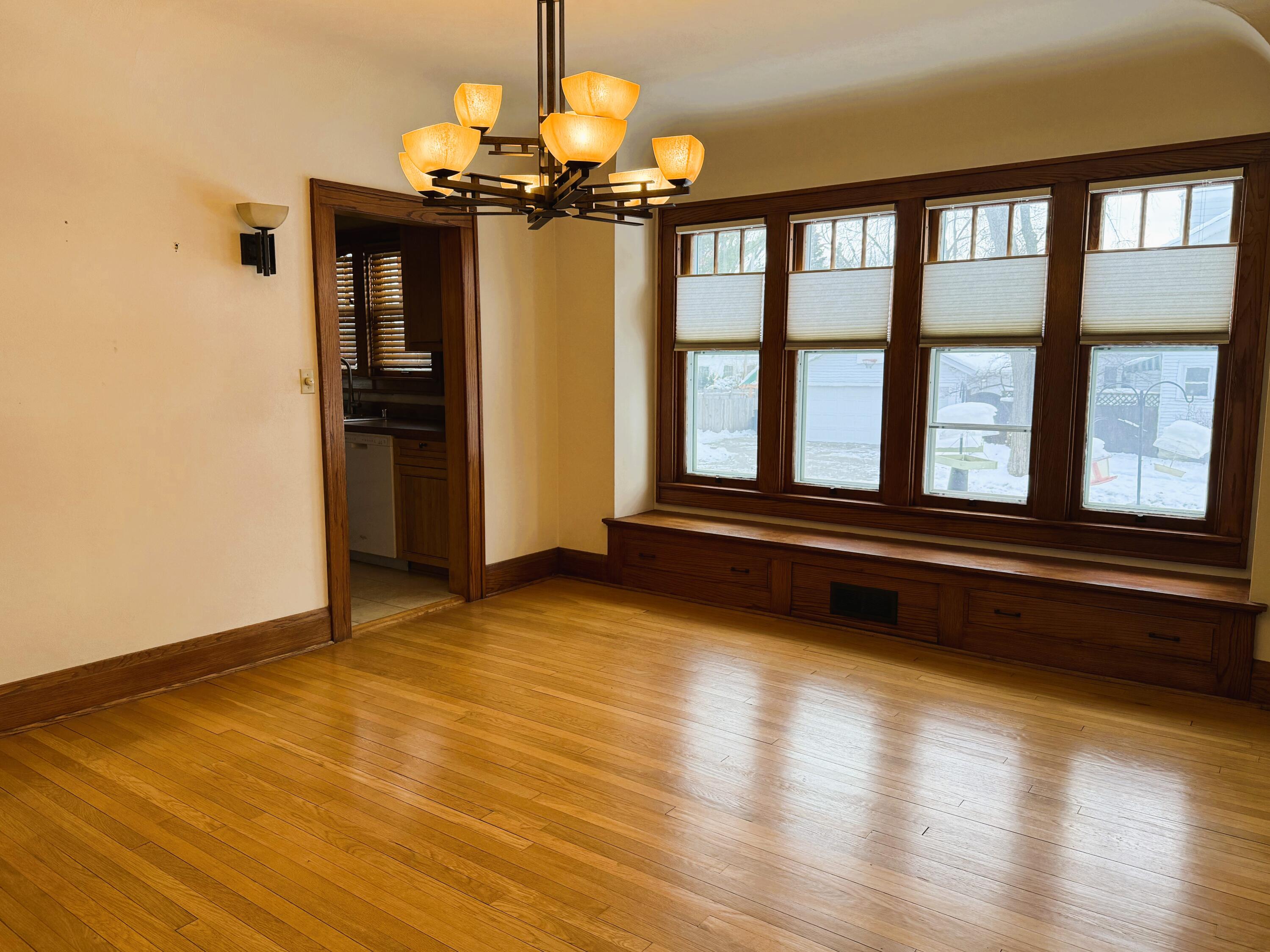 1904 North 83rd Street Wauwatosa, WI 53213 - Photo 9 of 29 HUGE Sunny DR w/Window Seat