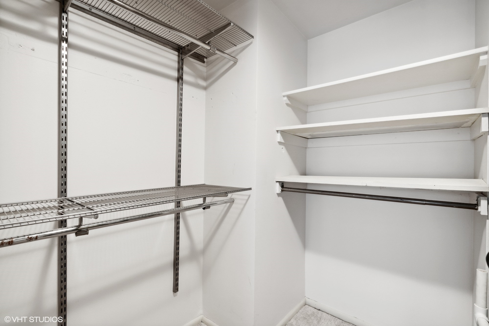 201 East Chestnut Street, Unit 10E Chicago, IL 60611 - Photo 7 of 12 a view of a room with rack on the wall