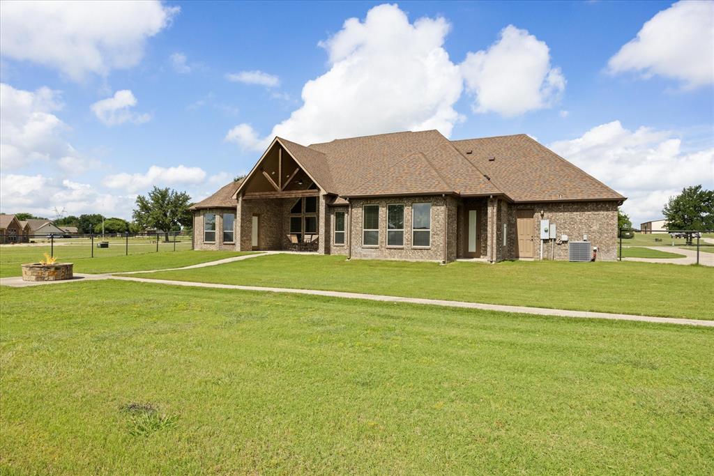 104 Rattling Antler Court Azle, TX 76020 - Photo 26 of 38 Fenced in back yard with fire pit, covered patio.