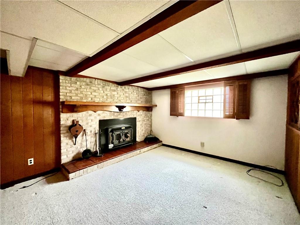 1291 Marcia Drive Irwin, PA 15642 - Photo 16 of 32 a view of an empty room with a fireplace