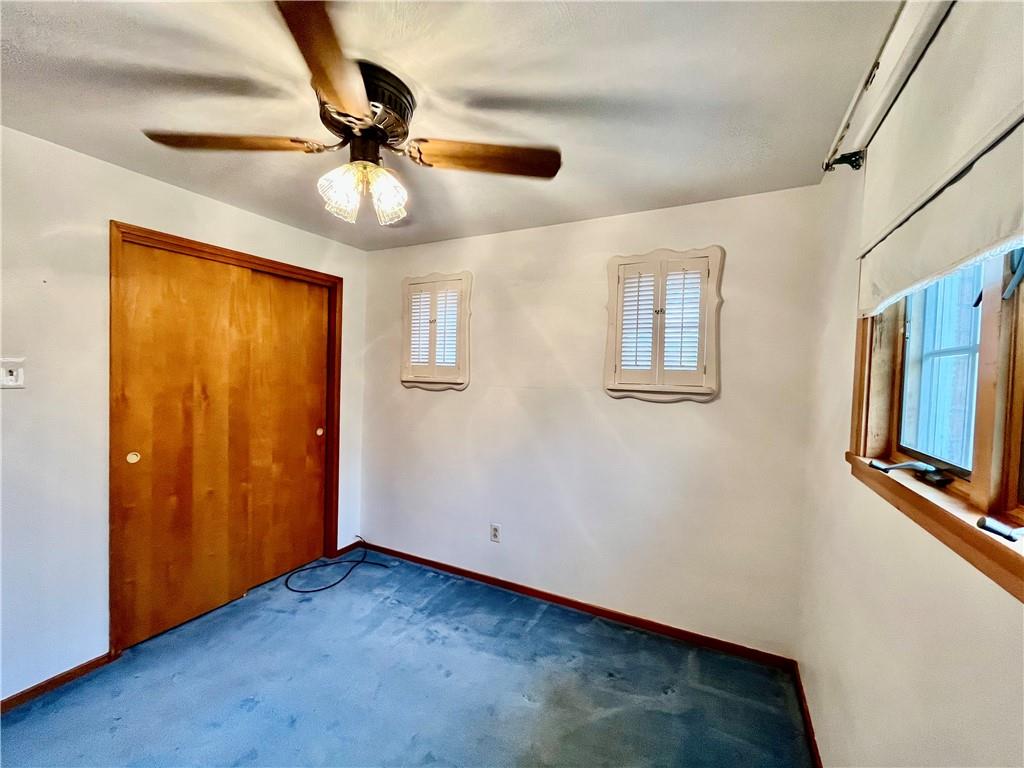 1291 Marcia Drive Irwin, PA 15642 - Photo 22 of 32 wooden floor in an empty room with a window