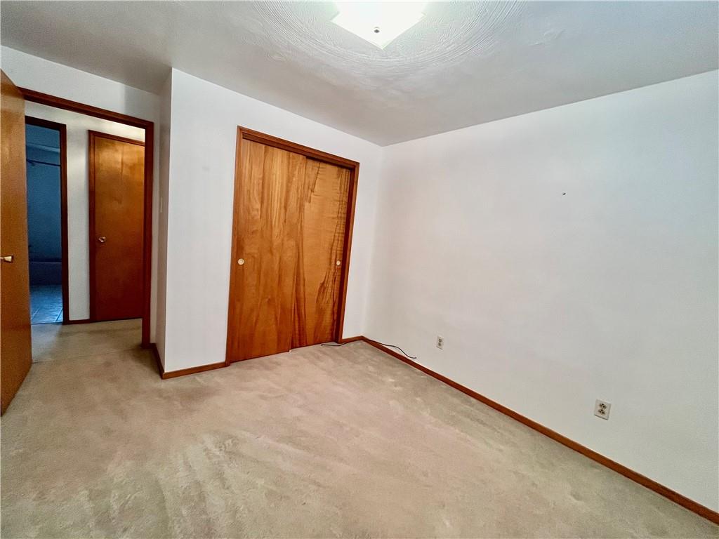 1291 Marcia Drive Irwin, PA 15642 - Photo 23 of 32 an empty room with windows