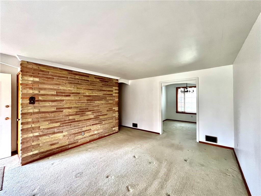 1291 Marcia Drive Irwin, PA 15642 - Photo 5 of 32 an empty room with windows