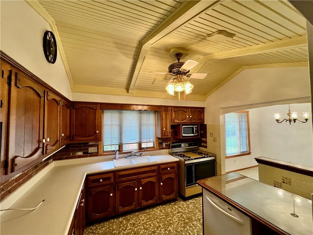 1291 Marcia Drive Irwin, PA 15642 - Photo 10 of 32 a kitchen with a sink appliances and cabinets