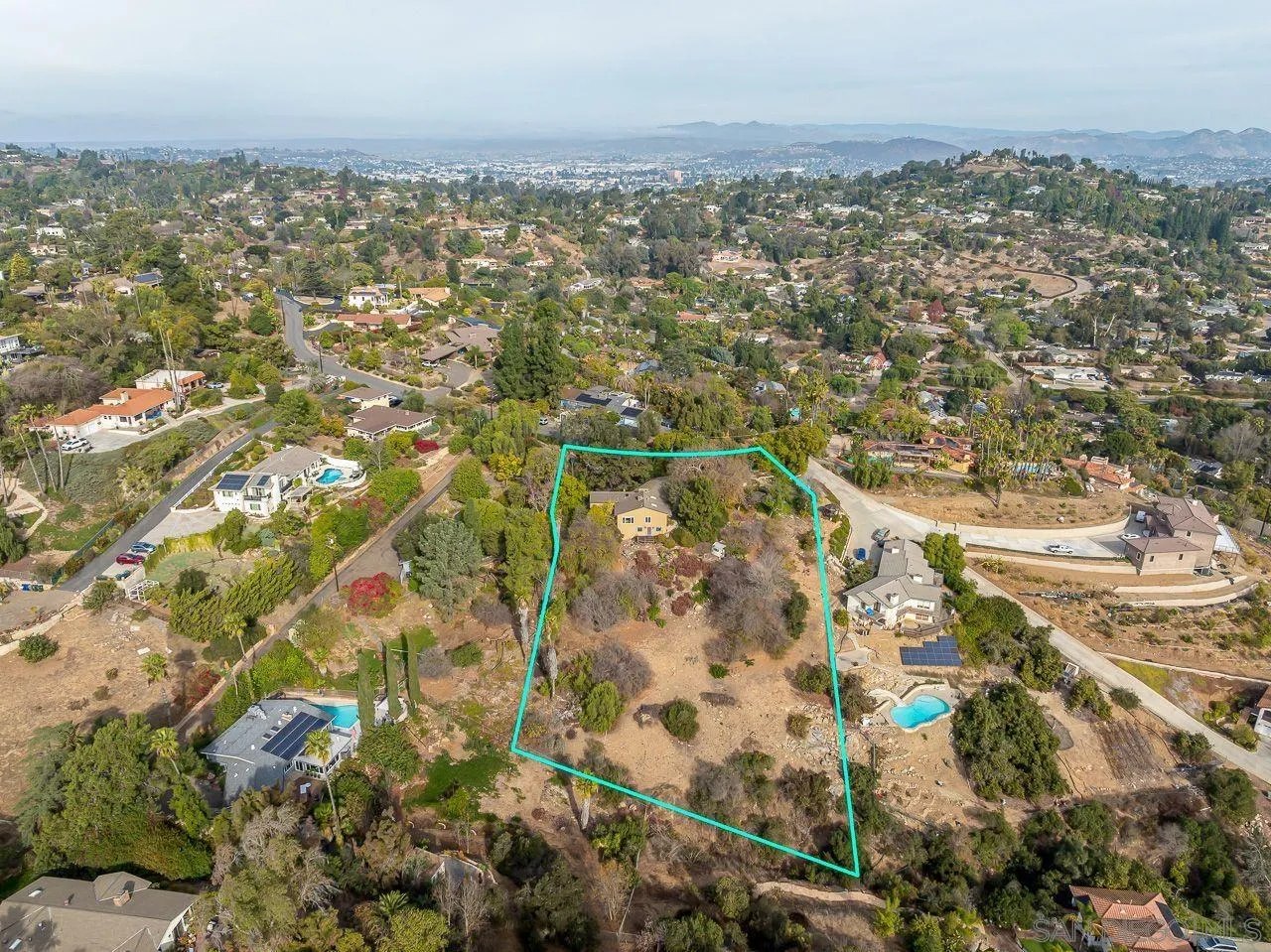 4380 Mayapan Drive El Cajon, CA 92020 - Photo 11 of 52 an aerial view of residential building with parking space