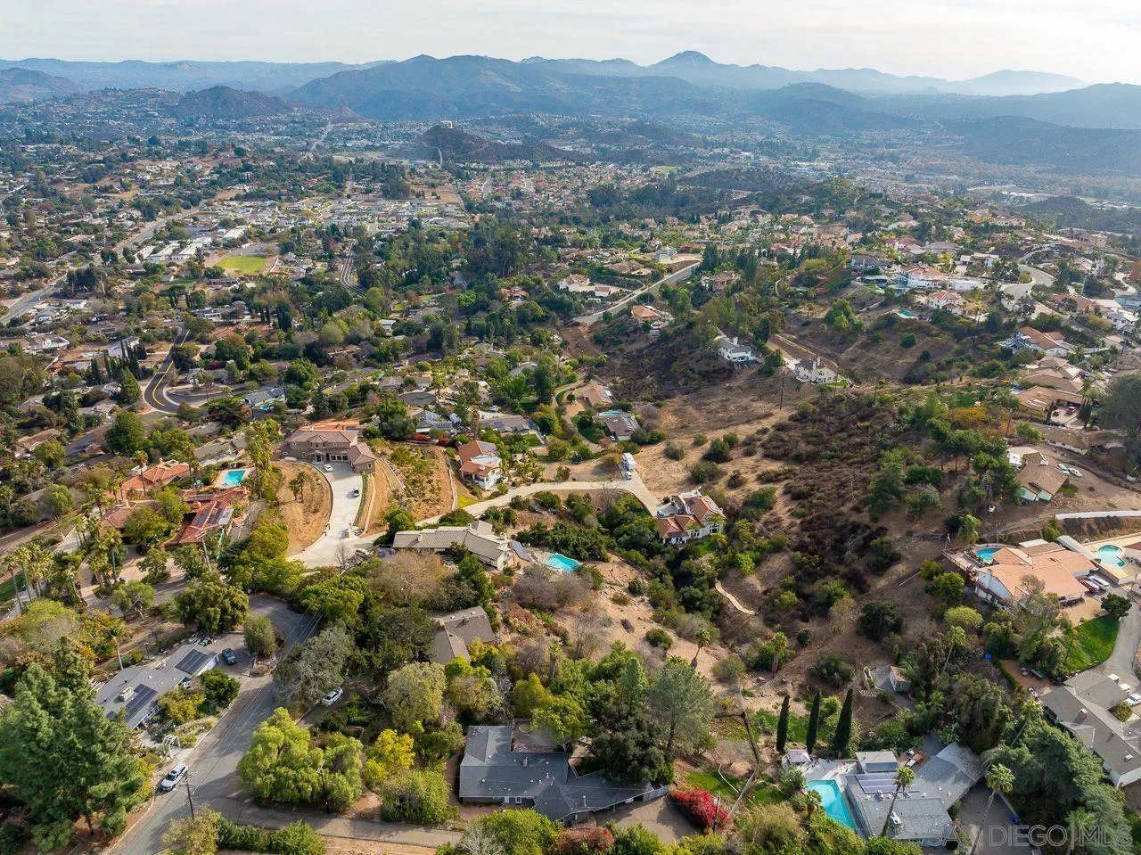 4380 Mayapan Drive El Cajon, CA 92020 - Photo 2 of 52 an aerial view of residential house and outdoor space