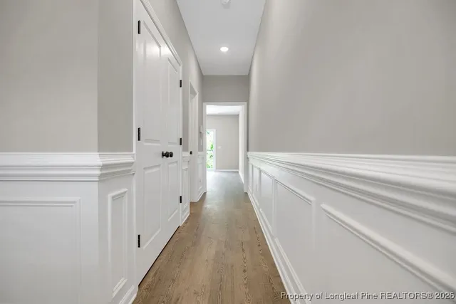 a view of a hallway with white walls
