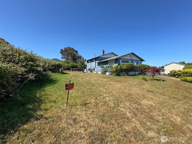 a view of a road with an outdoor space