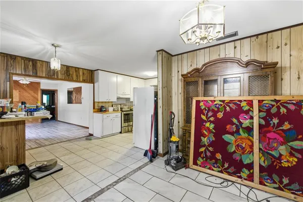 a view of a kitchen with storage and utility