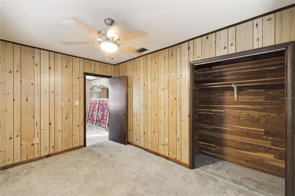 a view of an entryway with front door