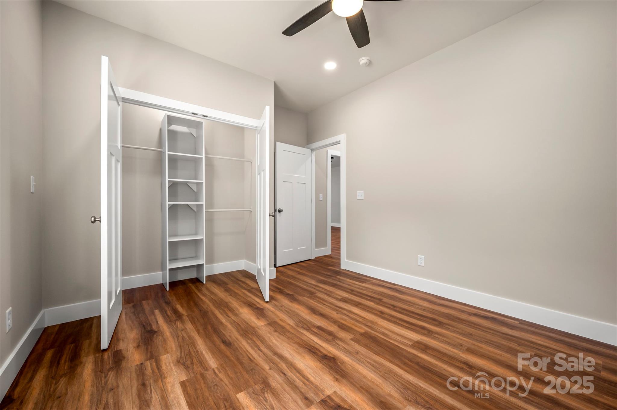 213 Calhoun Street Hendersonville, NC 28739 - Photo 26 of 32 wooden floor in an empty room