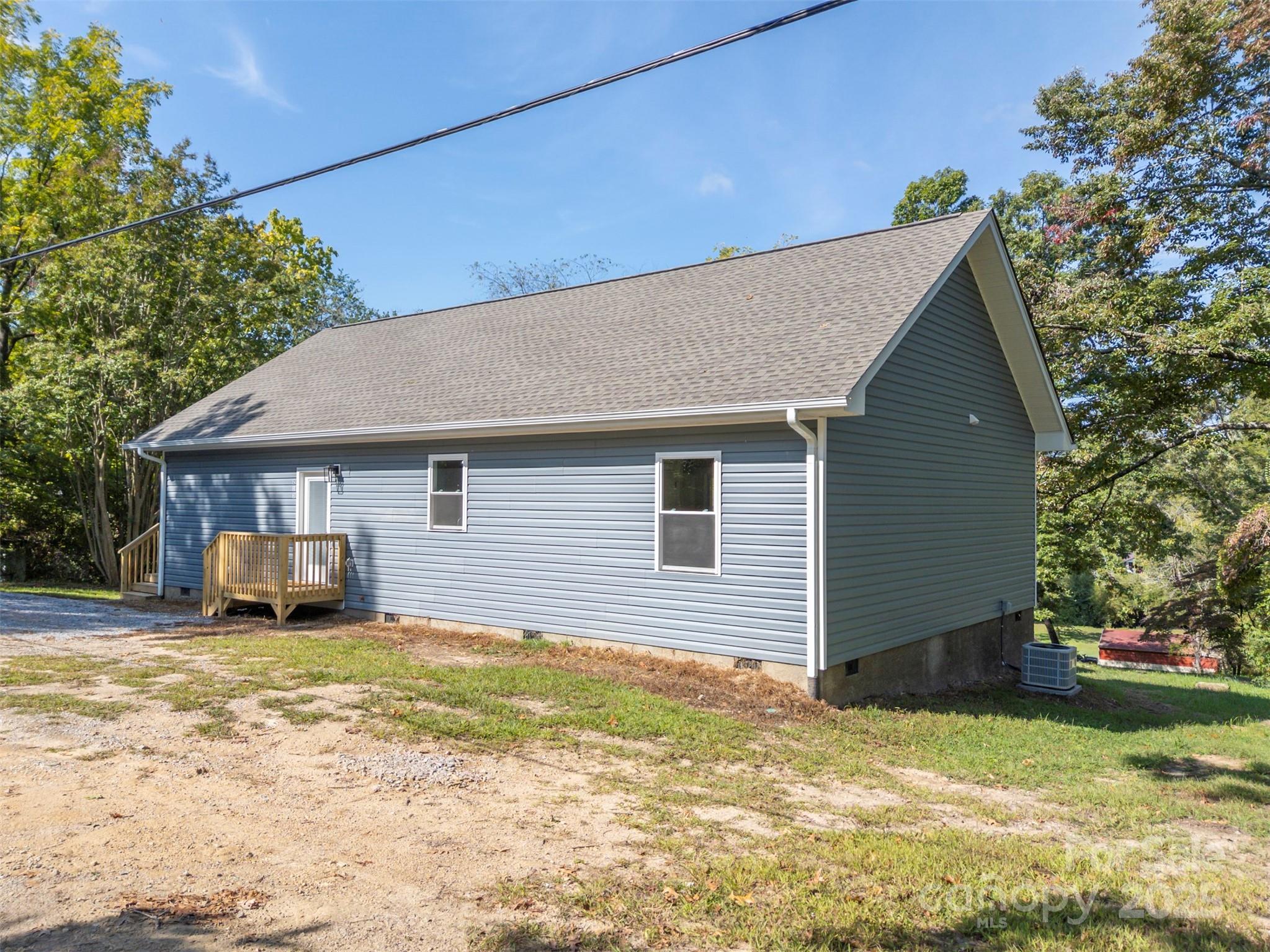 213 Calhoun Street Hendersonville, NC 28739 - Photo 27 of 32 a view of a house with a yard