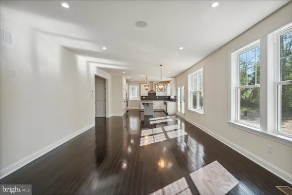 a view of a living room and dining room