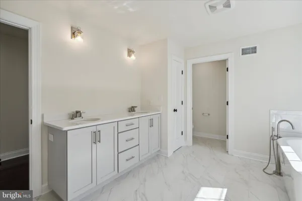 a view of a hallway with closet